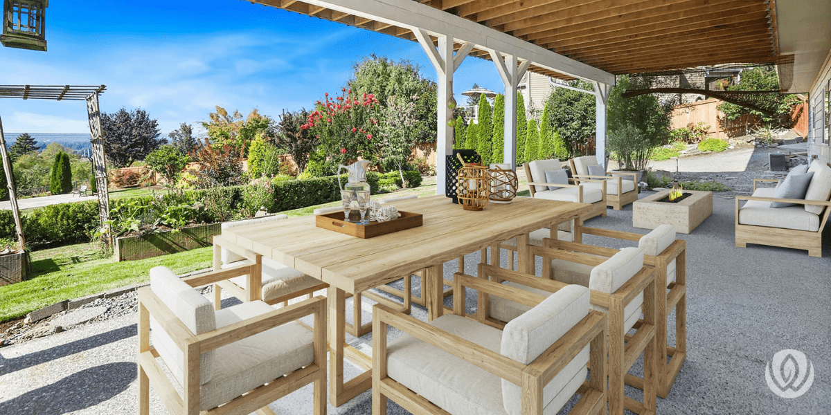 Stone patio with outdoor seating and landscaped garden