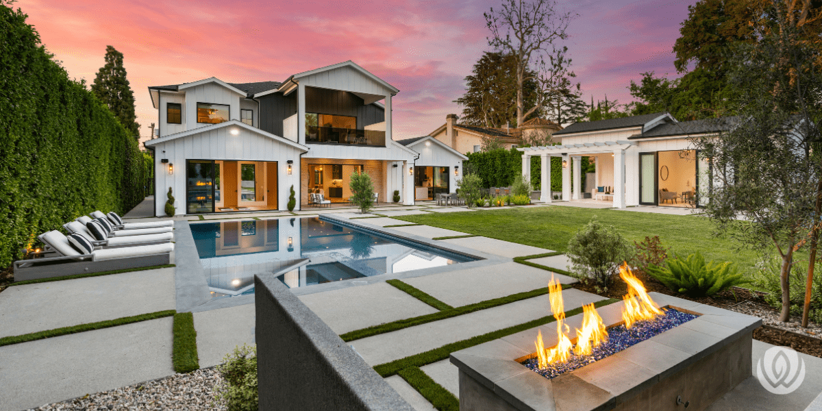 Luxury backyard pool with fire pit