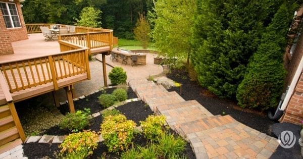 Natural stone steps integrated into hillside garden
