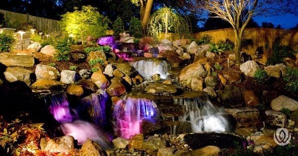 Sloped garden with decorative water feature